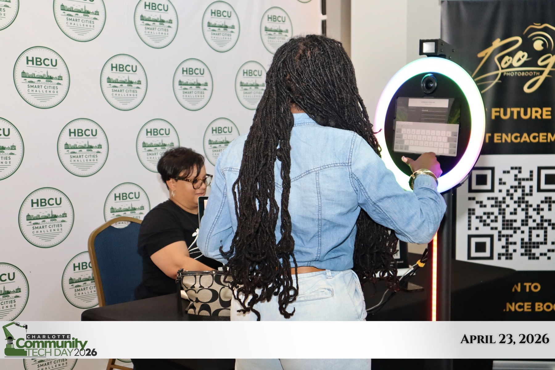 Guest using the Boo G photo booth at Community Tech Day