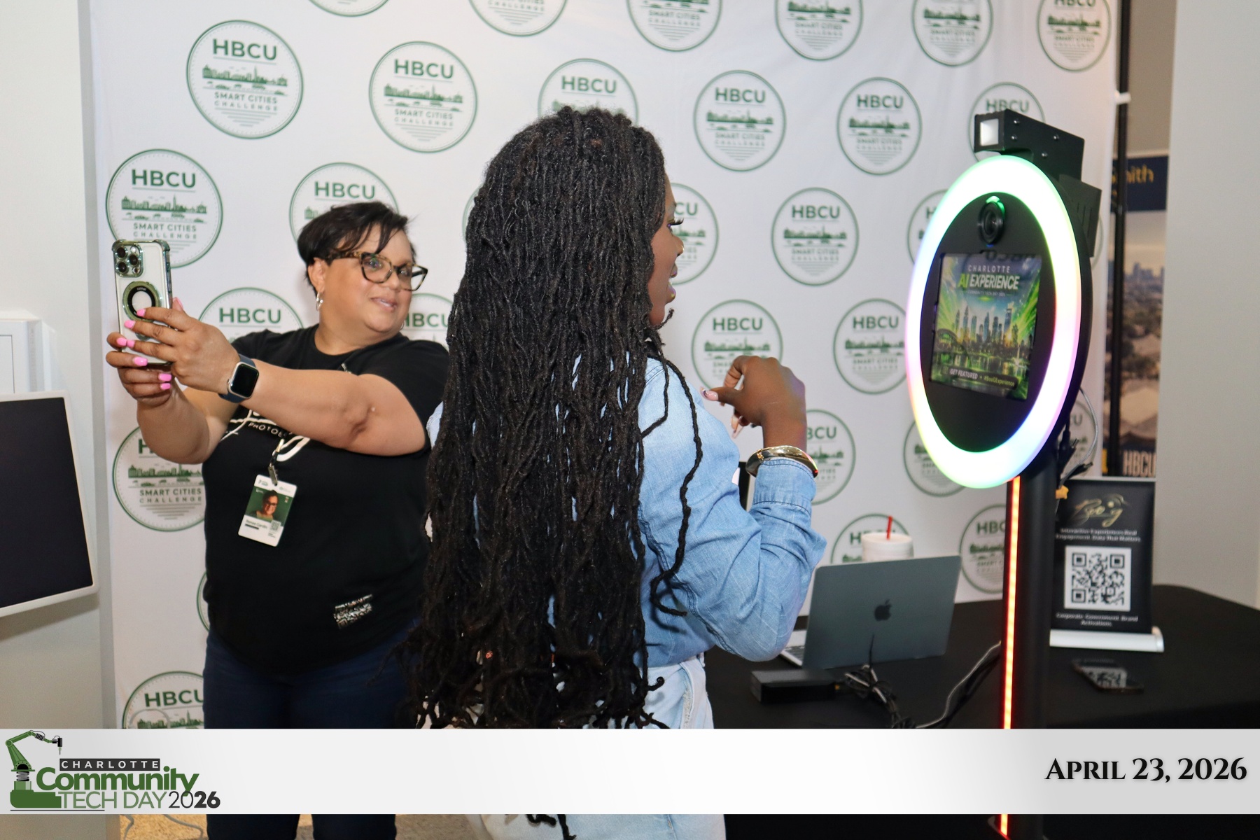 Renee assisting a guest at the illuminated Boo G photo booth